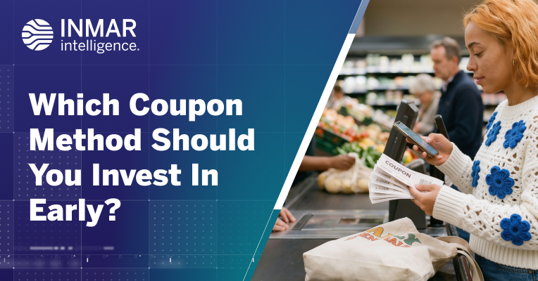 Shopper at a grocery checkout uses paper coupons while purchasing groceries, illustrating coupon methods for emerging CPG brands evaluating digital and traditional coupon strategies.