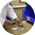 Technician Fills Order with NDC Check Technician Fills Order with NDC Check